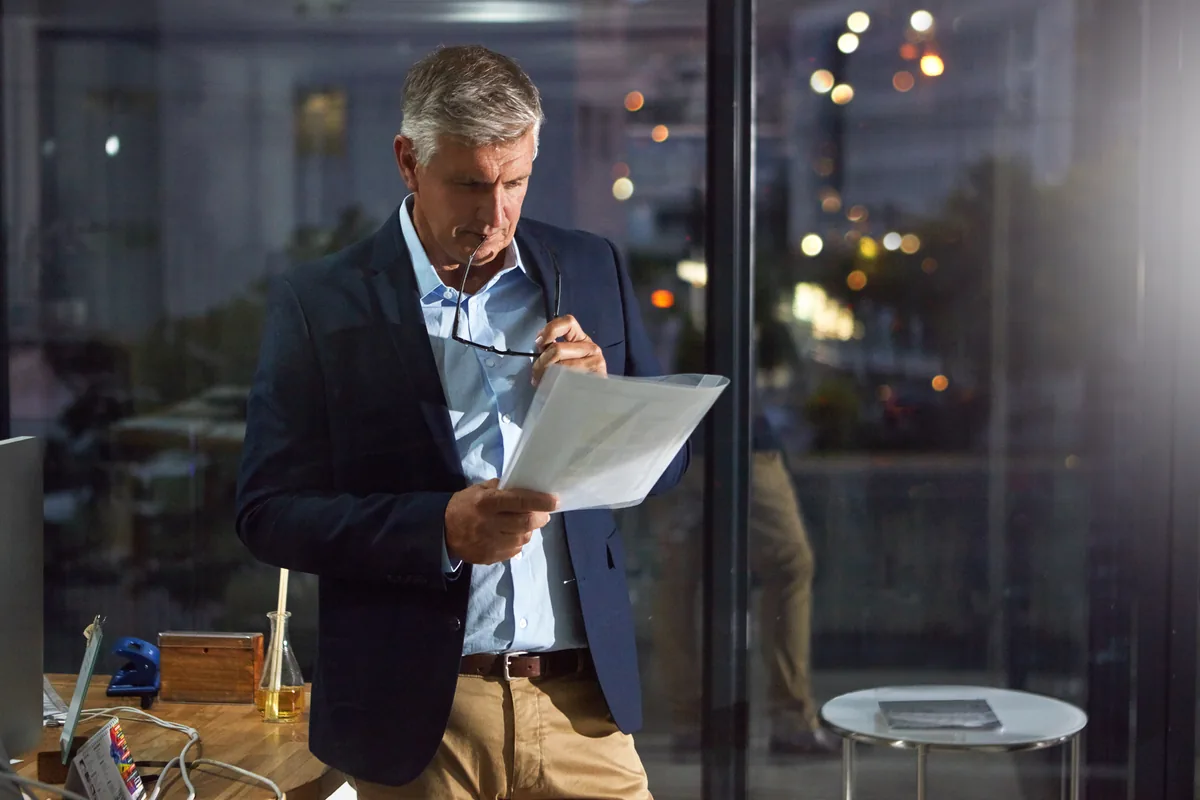 Executive reviewing Oracle licensing documentation